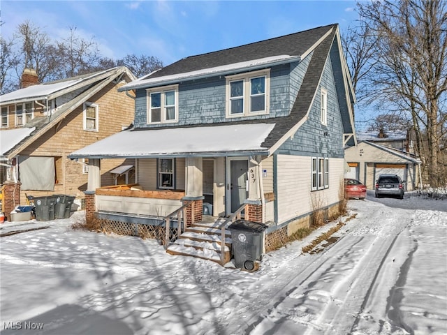 view of front of house featuring a porch and a garage