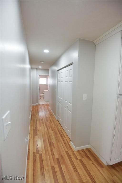 corridor featuring light hardwood / wood-style flooring