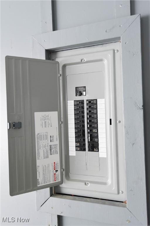 utility room featuring electric panel