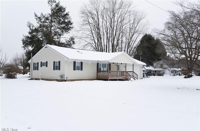 view of snow covered house