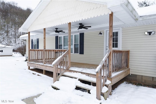 snow covered deck with ceiling fan