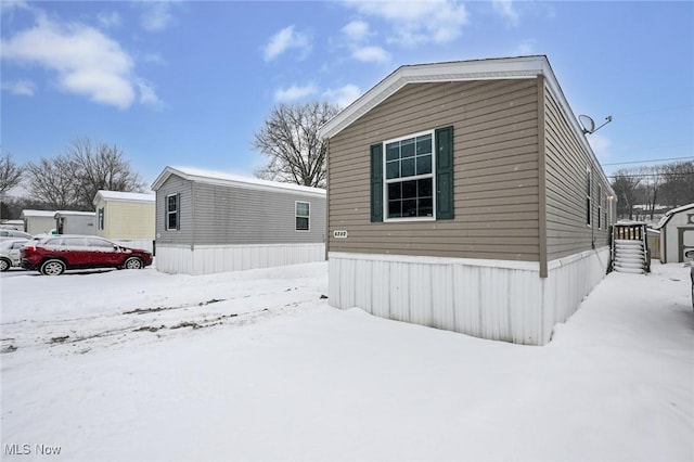 exterior space with a shed