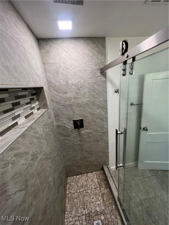 bathroom with walk in shower