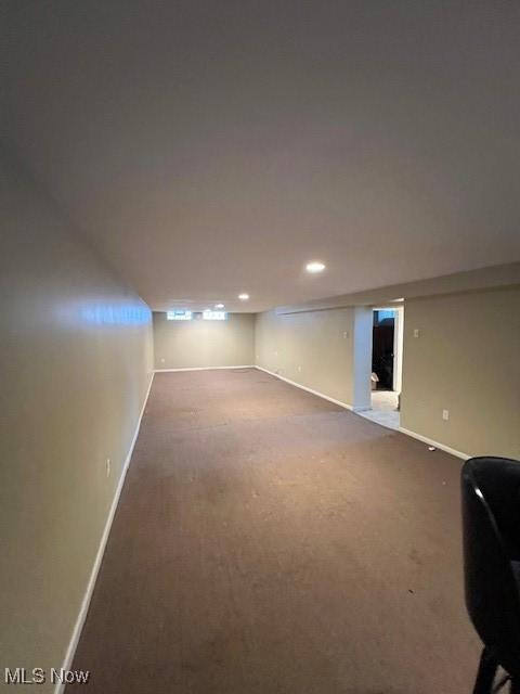 basement with carpet flooring