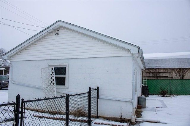 view of snow covered property