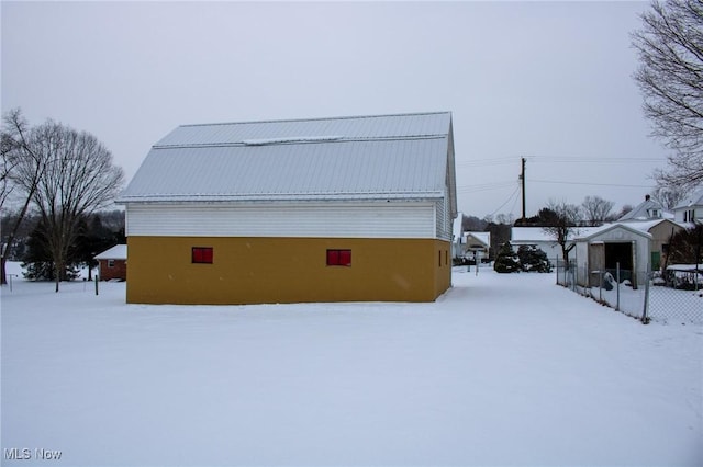 view of snow covered property