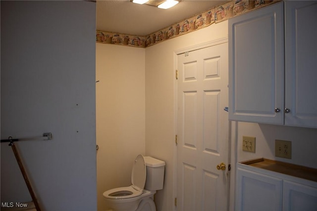 bathroom featuring toilet