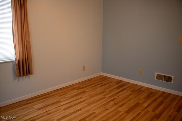 empty room featuring light wood-type flooring