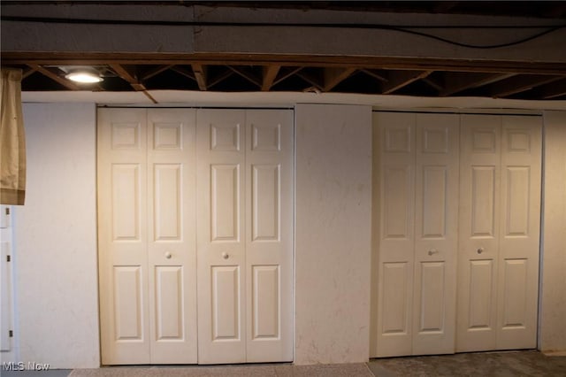 interior space featuring multiple closets