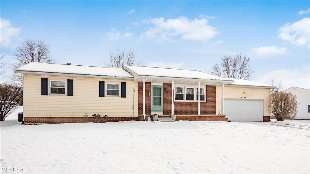 single story home with a garage