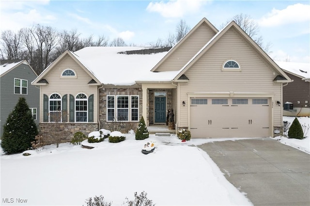 view of front of home with a garage