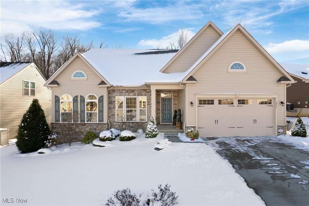 front of property with a garage