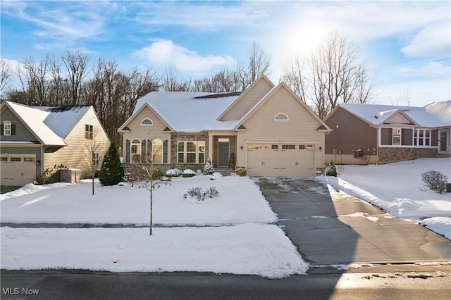 view of front of property featuring a garage