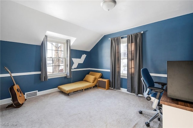 office area with lofted ceiling and carpet floors