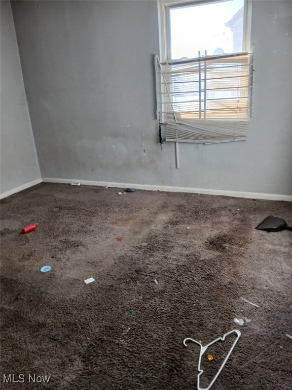 spare room featuring carpet