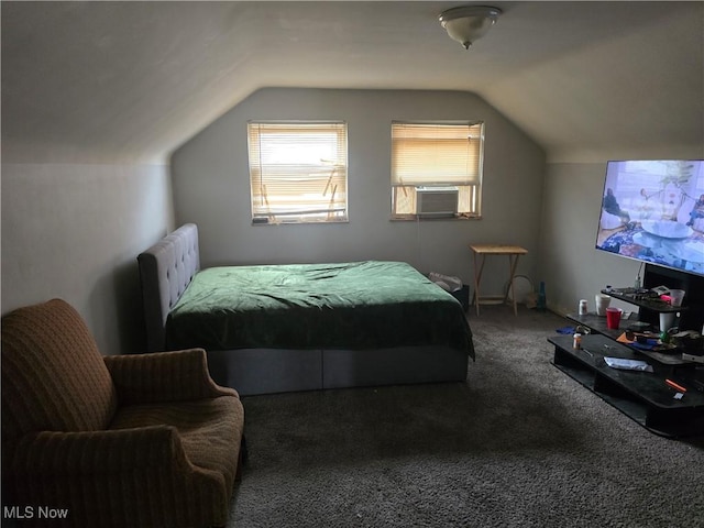 bedroom featuring cooling unit, vaulted ceiling, and carpet flooring