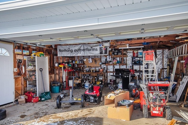 garage with a workshop area