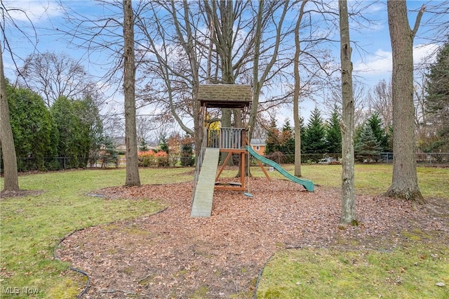 view of play area featuring a lawn