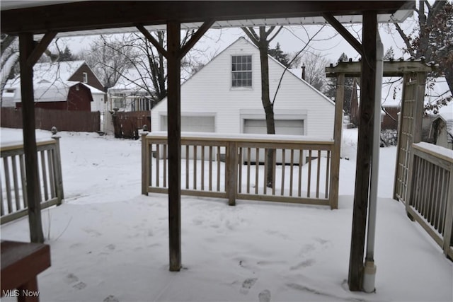 view of snow covered deck