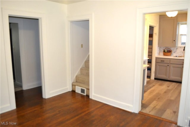 interior space with dark wood-type flooring