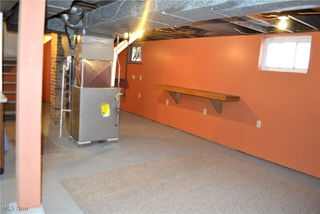 basement featuring heating unit