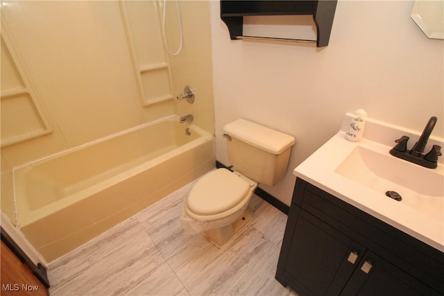 full bathroom with toilet, shower / bathing tub combination, and vanity