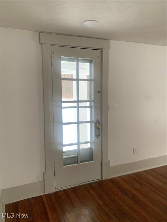 doorway featuring hardwood / wood-style floors