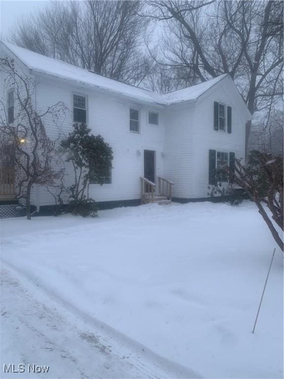 view of snow covered property