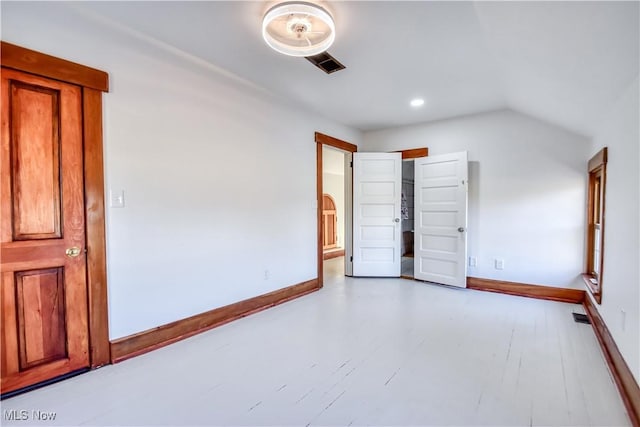 interior space with recessed lighting, visible vents, and baseboards