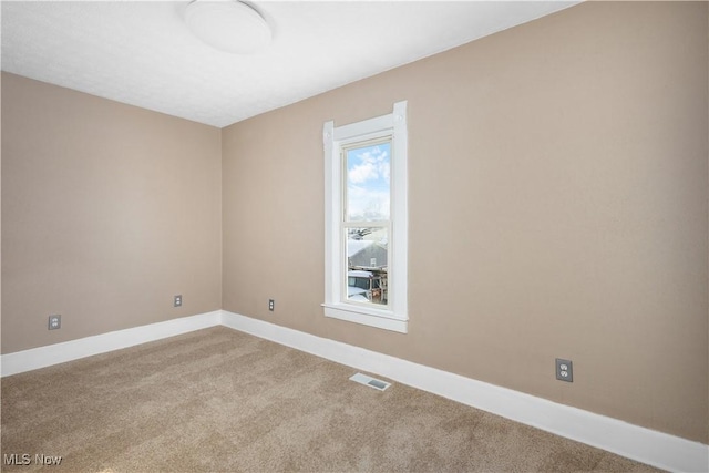 view of carpeted spare room