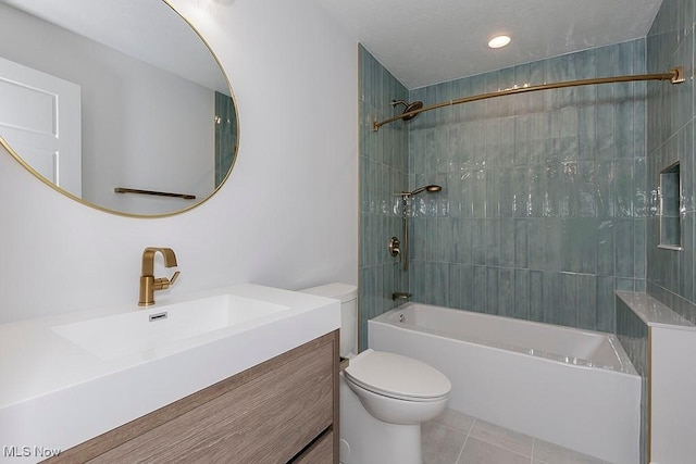 full bath with shower / washtub combination, vanity, toilet, and tile patterned floors