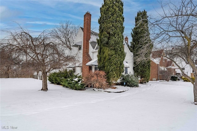 view of snow covered property