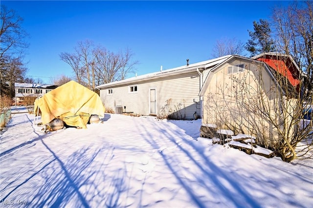 view of snow covered house