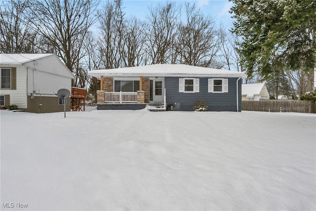 single story home with covered porch