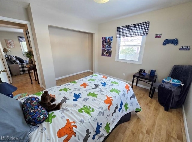 bedroom featuring light wood-type flooring