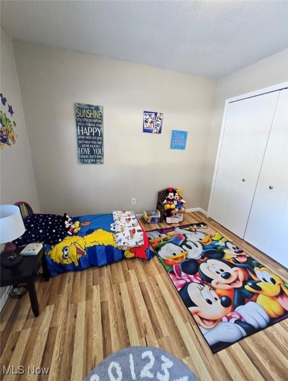 bedroom featuring hardwood / wood-style flooring