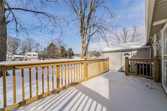 view of snow covered deck