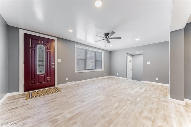 entrance foyer featuring ceiling fan and light wood-type flooring