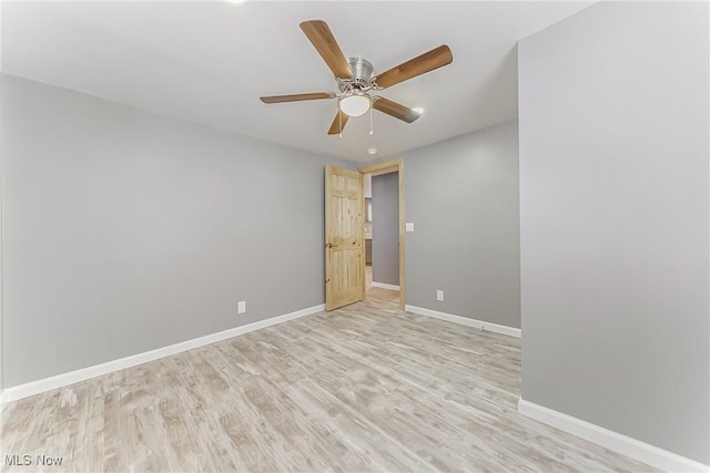 unfurnished room with light hardwood / wood-style floors and ceiling fan