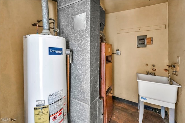 utilities featuring sink and gas water heater