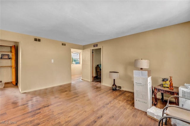 spare room featuring light wood-type flooring