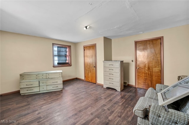 interior space with dark hardwood / wood-style floors