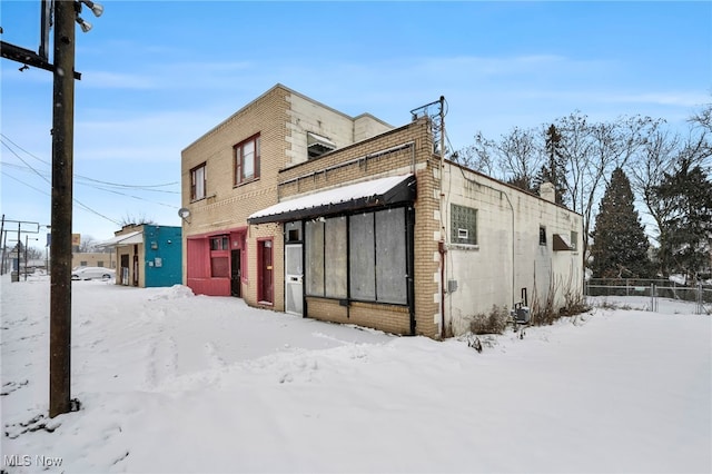 view of snow covered property