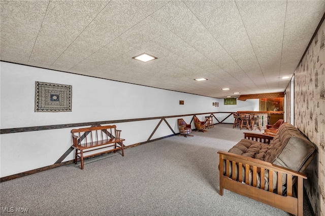 sitting room featuring carpet flooring