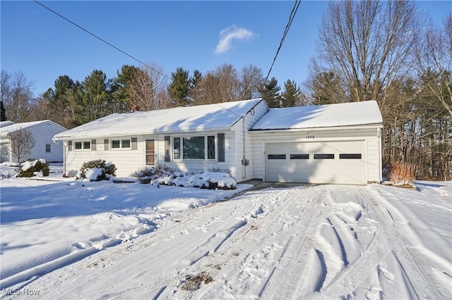 single story home featuring a garage