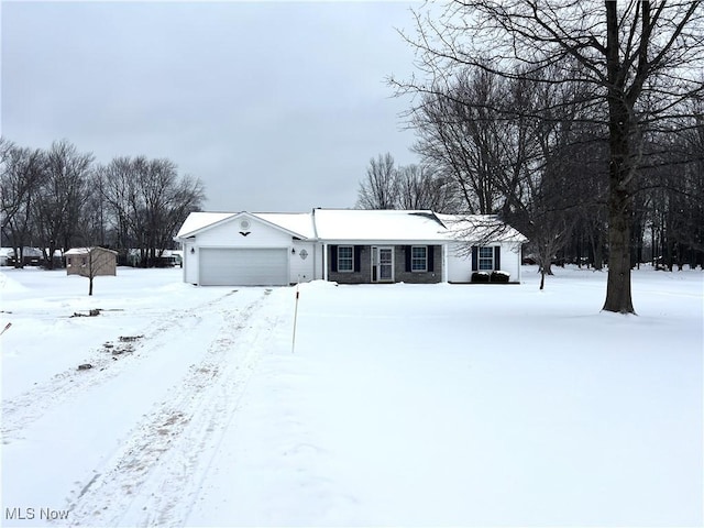 single story home featuring a garage