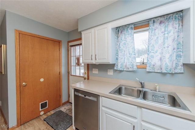 kitchen featuring sink, white cabinetry, and dishwasher