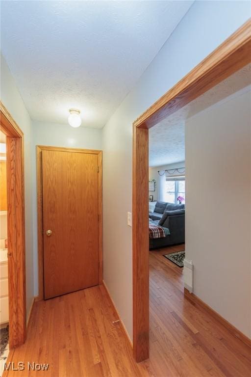 hallway featuring light hardwood / wood-style floors