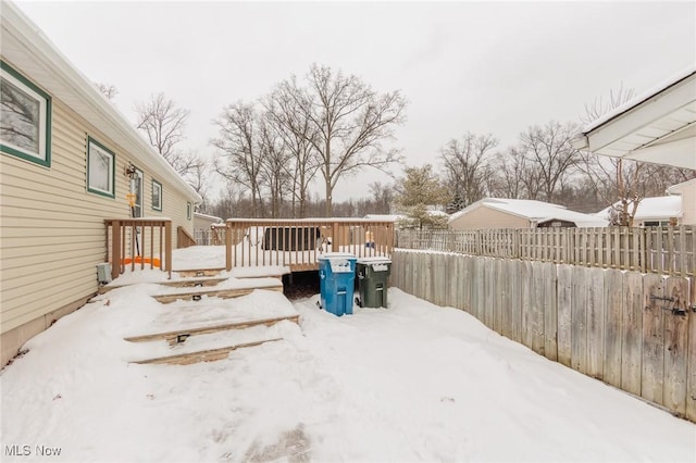 view of snow covered deck