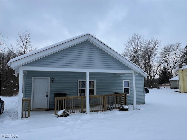 view of snow covered house